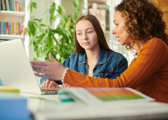 Two women discussing apprenticeships